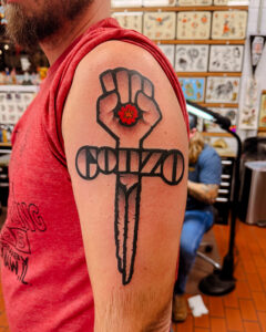 Ezra Coates Brass Eagle Tattoo Peoria Gonzo Fist