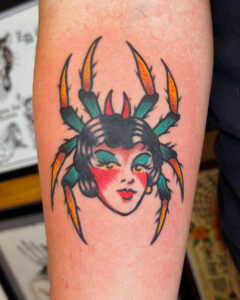 Ezra Coates Brass Eagle Tattoo Peoria Traditional Spider Lady Head