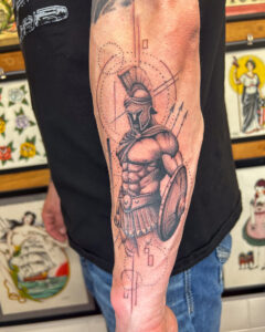 Sam Lott Brass Eagle Tattoo Peoria Fine Line Black and Grey Warrior