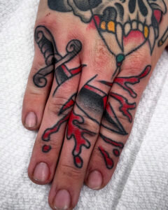 Terry Lessard Brass Eagle Tattoo Dagger on Fingers