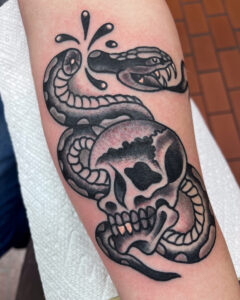 Terry Lessard Brass Eagle Tattoo Traditional Skull and Snake