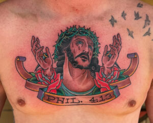 Zach Dole Brass Eagle Tattoo Peoria Traditional Jesus on Chest