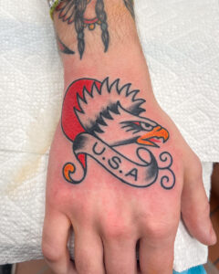 Zach Dole Brass Eagle Tattoo Peoria Traditional Eagle on Hand